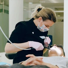 Smiling patient at a family dental clinic in Orléans