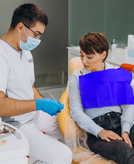 Dentist consulting with a patient at Trillium Dental in Kanata