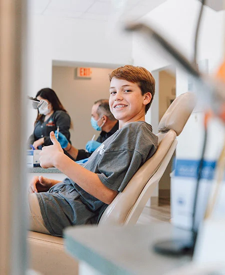 Smiling patient at a family dental clinic in Orléans